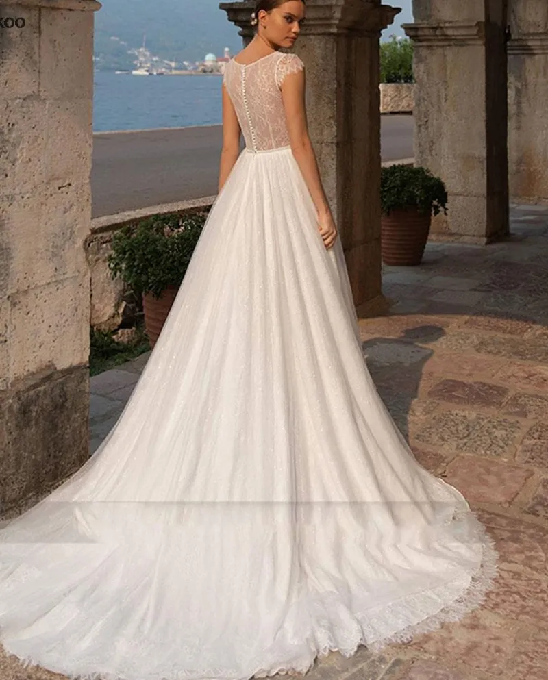 Principessa Beach Abiti da sposa per le donne Pizzo Tulle Illuison Cap Sleev